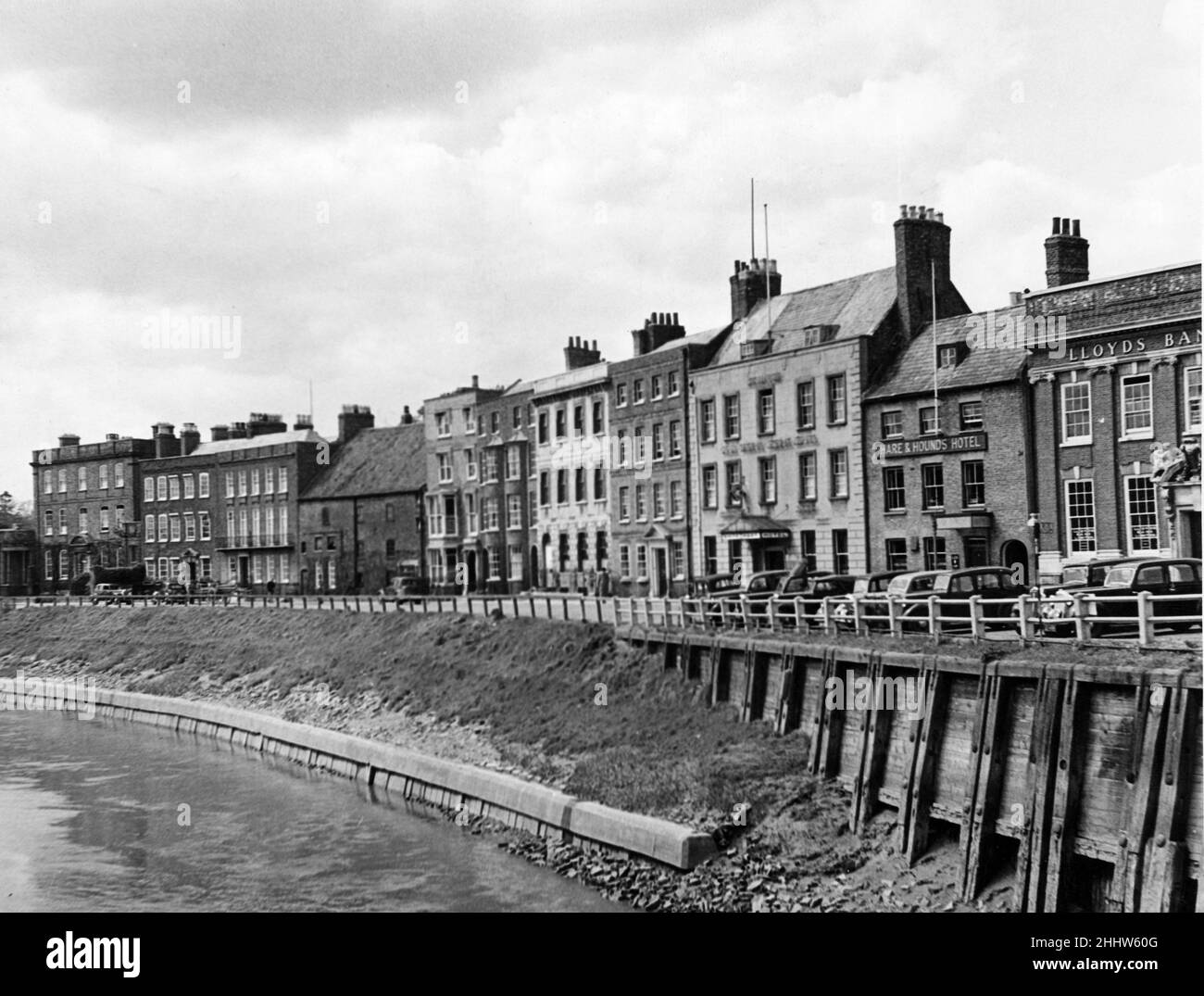 The West Canal main drainage channel for the surrounding Fens, runs straight through the town of Wisbech. Fine Georgian architecture on the North Brink overlooks the canal. 9th May 1947. Stock Photo