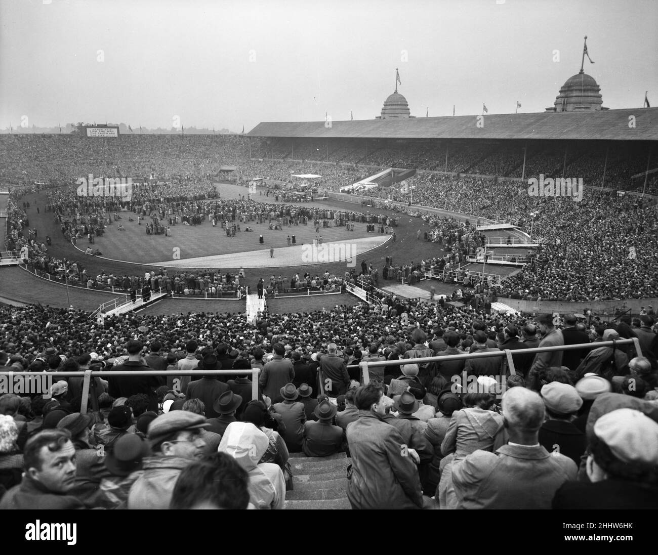 American evangelist Billy Graham speaking at Wembley Stadium during  the final meeting of his  three month London crusade.  23rd May 1954. Stock Photo