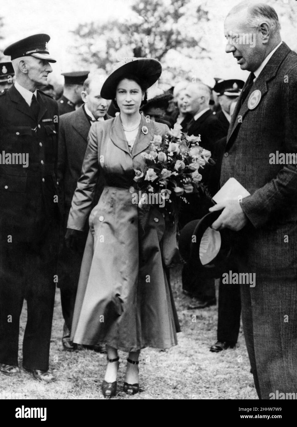 Princess Elizabeth (later Queen Elizabeth II) during a visit to Wales, pictured at the main show ring, greeted by Col H C C Batten (Superintendent of Works). May 1948. Stock Photo