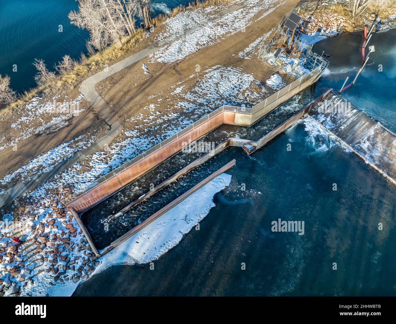 fish ladder at water diversion dam - Watson Lake Dam on the Poudre River in northern Colorado, aerial view of winter scenery, wildlife management conc Stock Photo