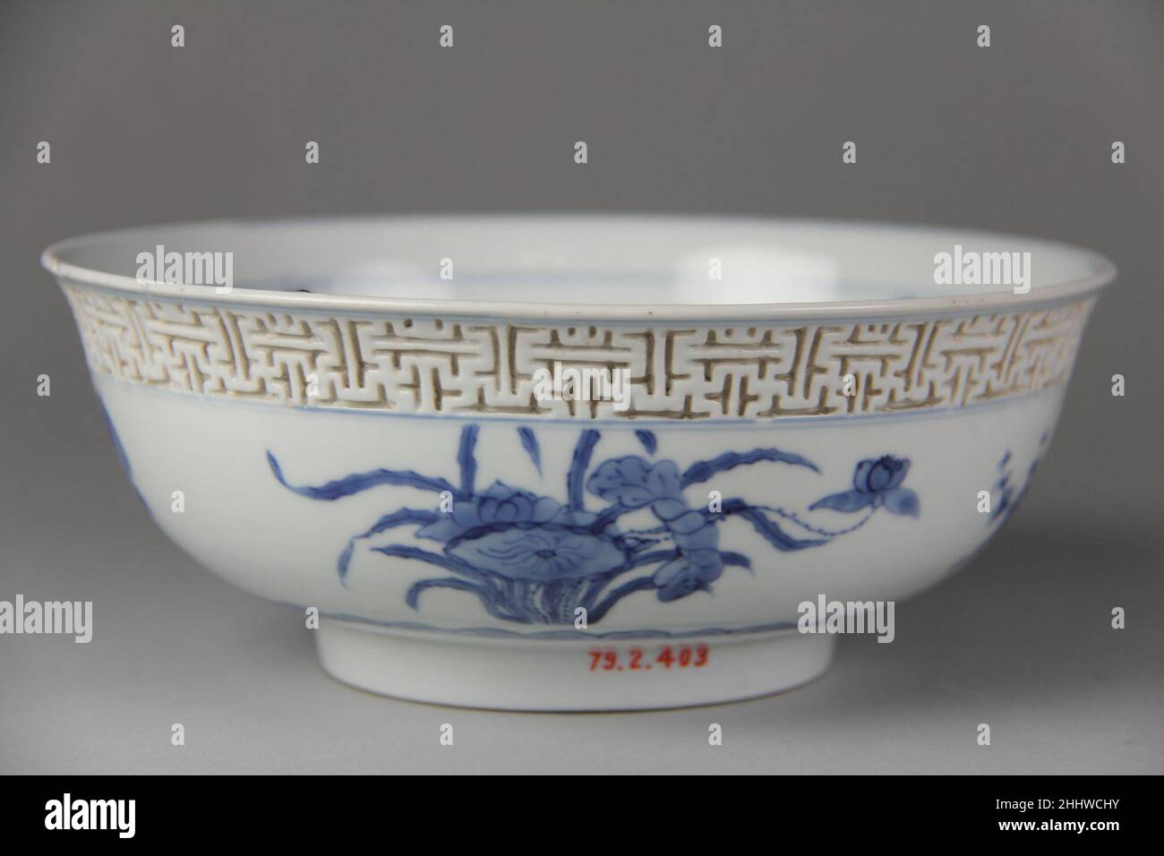 Bowl with immortals and flowers late 17th–early 18th century China. Bowl  with immortals and flowers. China. late 17th–early 18th century. Porcelain  painted in underglaze cobalt blue, and with relief decoration (Jingdezhen  ware).