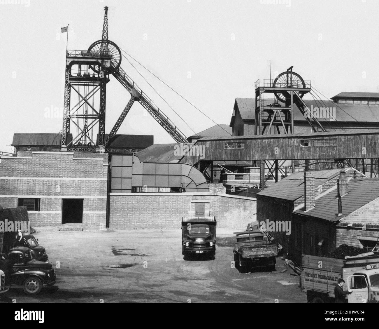 The Hamstead Colliery Fire of 4th March 1908, killed 26 men in one day. When a fire broke out there were 31 miners in the pit, 6 escaped before poisonous fumes built up in the roadways. Rescue teams made many attempts to reach the entombed men. On 11 March, 14 bodies were recovered, and 6 more were recovered the following day. One of the victims was a member of the rescue team from Altofts, John Welsby. Pictured, Hamstead Colliery, with new electrical ventilation fan (centre) 15th July 1955. Stock Photo