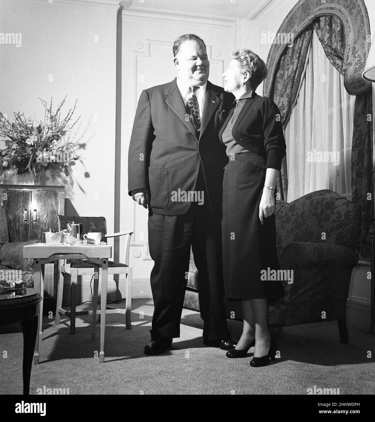 Stan Laurel and Oliver Hardy, arrived in the UK Monday (28th January), travelling on the RMS Queen Mary ocean liner, for a 10 week variety tour of British Music Halls, pictured London, Tuesday 29th January 1952.  Our Picture Shows ... Oliver Hardy and wife Virginia Lucille Jones. Stock Photo