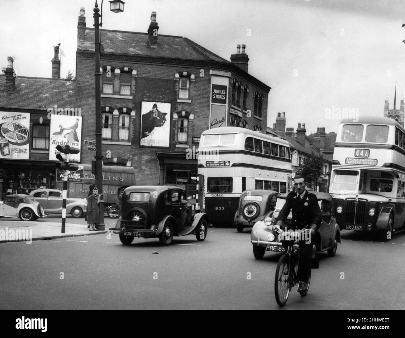 Stratford Road, Sparkbrook, West Midlands - traffic moving along the main road past Stoney Lane. 12th August 1952. Stock Photo