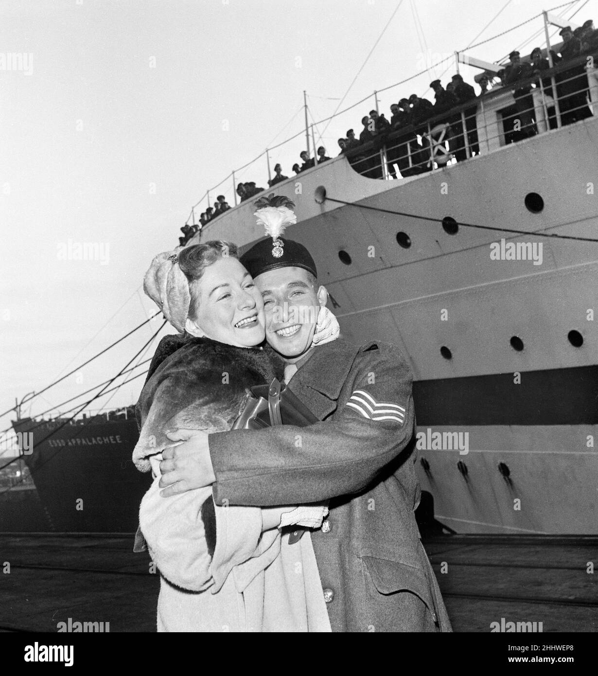Sergeant David Sharp of the Royal Northumberland Fusiliers, the last British Prisoner of War to be released from Korea, is greeted by his mother Sadie on arrival in Southampton.26th October 1953. Stock Photo