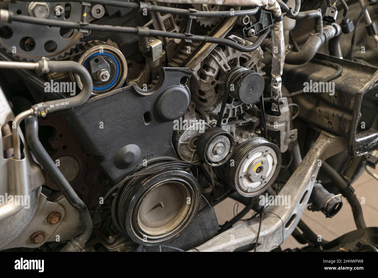 Broken belt in the car engine 4 Stock Photo Alamy