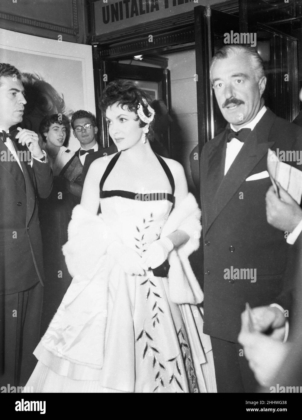 Gina Lollobrigida, Italian Actress, and Vittorio De Sica , film director, attend the opening of the Italian Film Festival at the Tivoli Theatre, The Strand, London, Monday 25th October 1954. Stock Photo