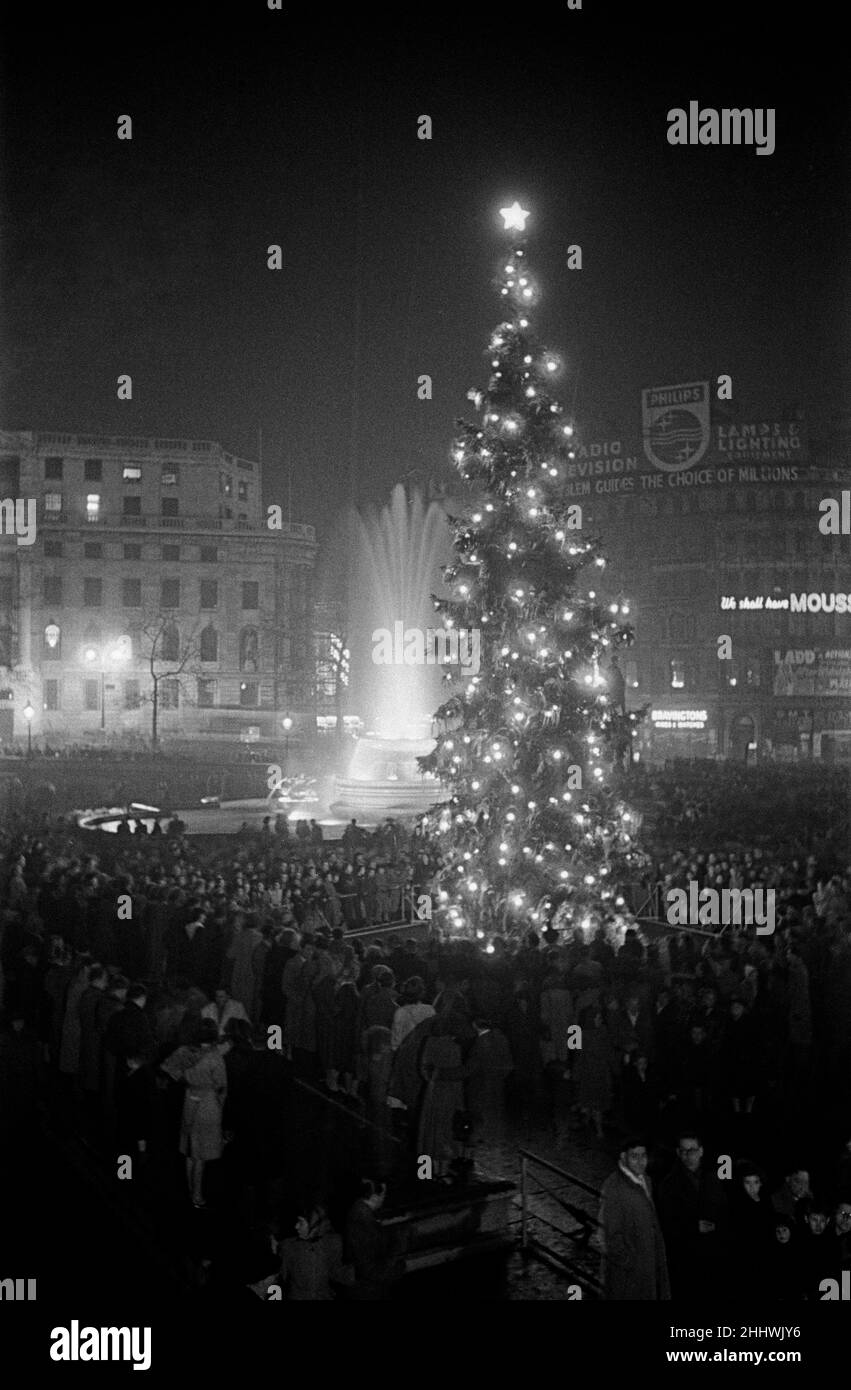 Carol singing around the Christmas Tree in Trafalgar Square, London