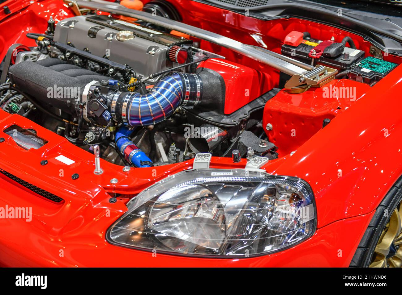 Details of red car engine. Modification of the turbo engine Stock Photo