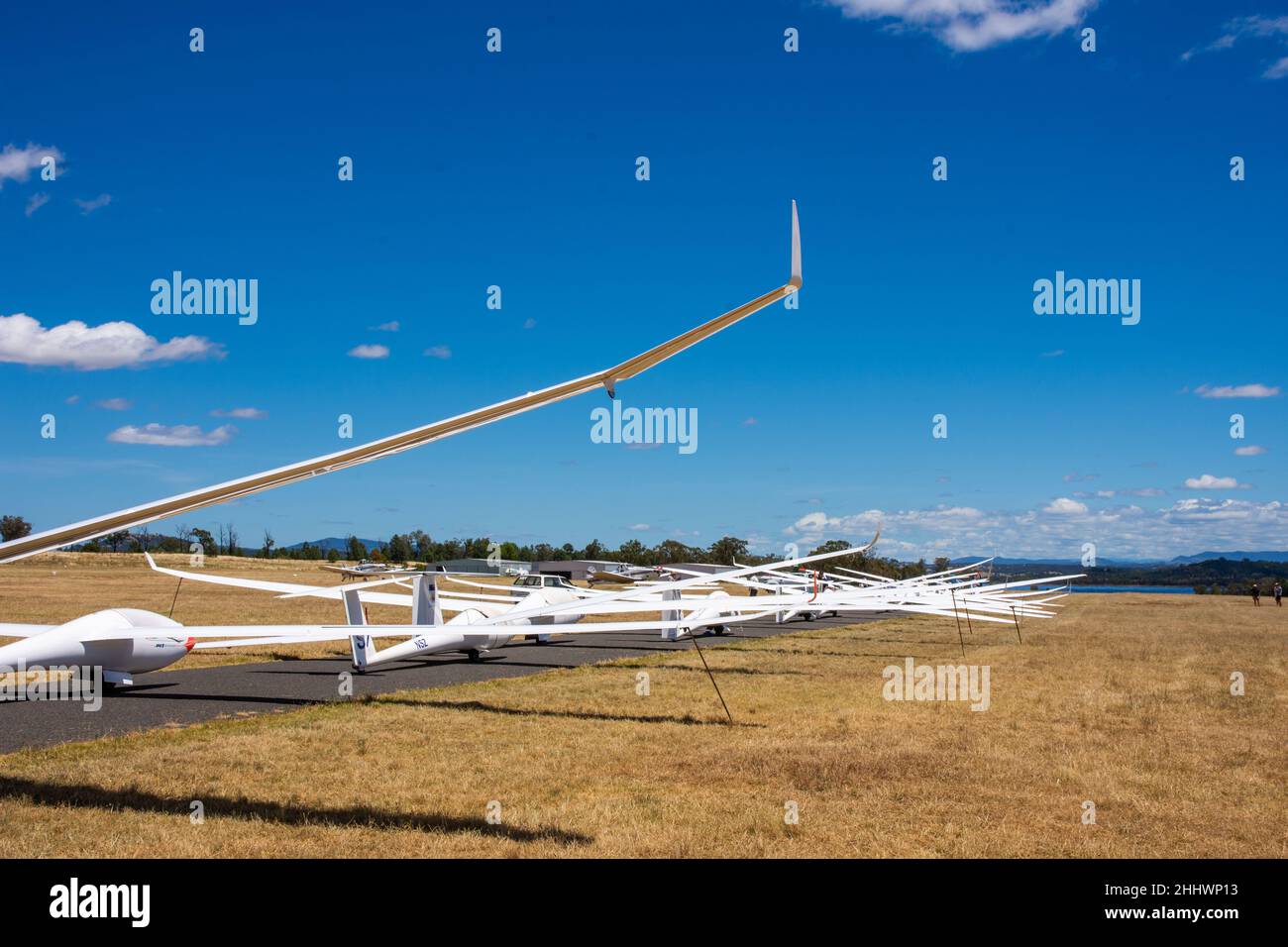Sailplanes in a queue waiting for tug planes to tow them for lift off at Lake Keepit Soaring Club airfield ,Gunnedah Australia. Stock Photo