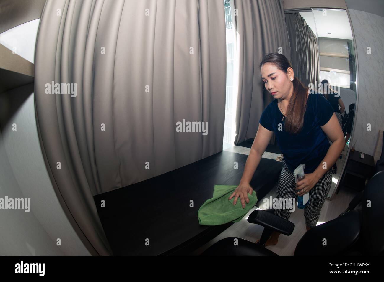 Asian lady cleaning her house hi-res stock photography and images - Alamy
