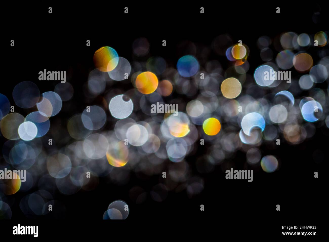 Abstract bokeh texture on black background Stock Photo - Alamy