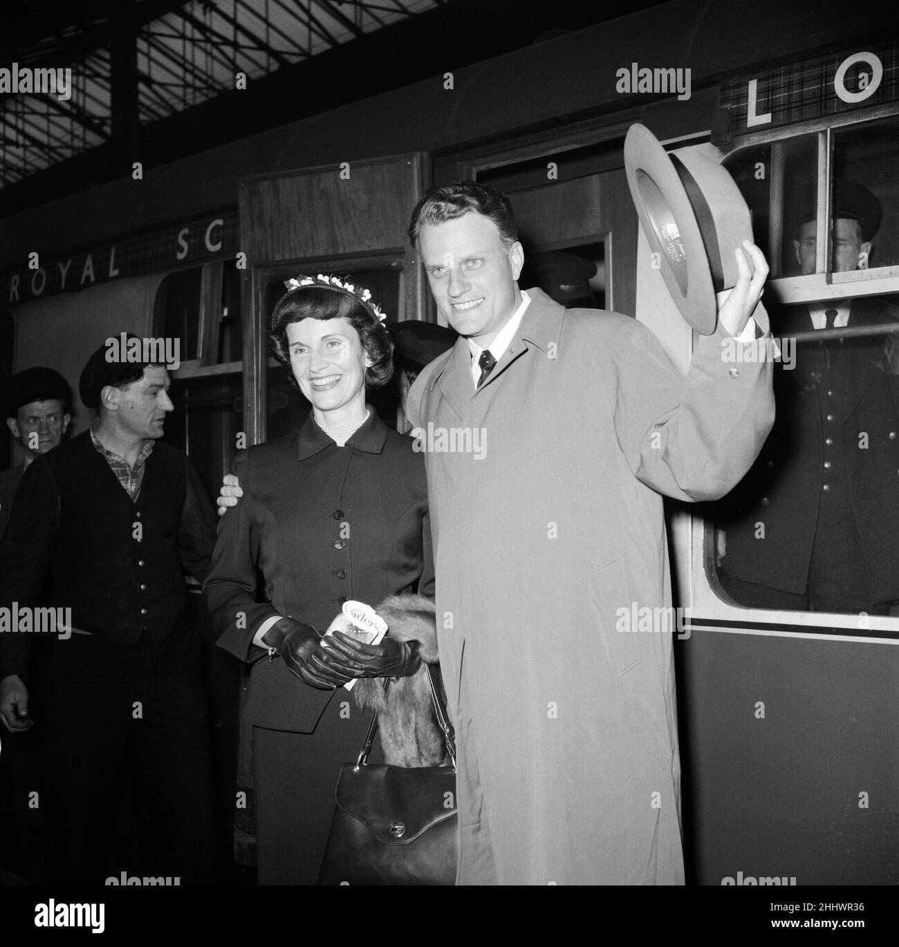 Billy Graham, the evangelist, arrived in London tonight with his wife Ruth after his successful Scottish tour. 11th May 1955. Stock Photo