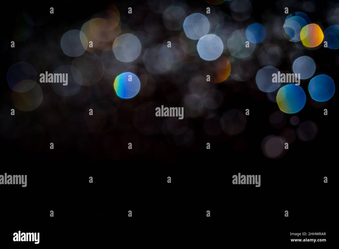 Abstract bokeh texture on black background Stock Photo - Alamy