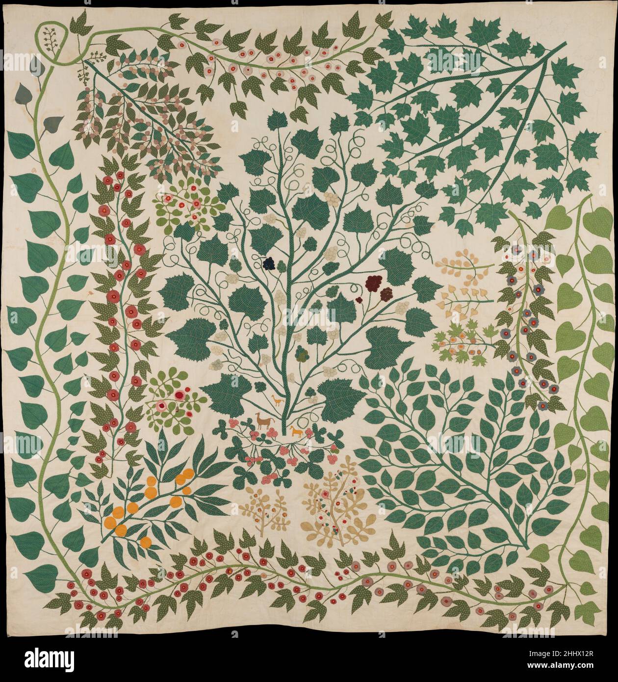 Branches and Vines Quilt ca. 1875 Ernestine Eberhardt Zaumseil American Working in the later years of the nineteenth century, Ernestine Zaumseil created this extraordinary quilt employing the Tree of Life pattern, a design that has been popular for use on bedcovers since the seventeenth century. The first Tree of Life bedcovers, called “palampores”, were of Indian origin and featured a stylized tree bearing fantastical fruits and flowers. An Indian palampore makes up the central panel of quilt 2014.263 in the American Wing's collection. In Zaumseil’s quilt, the trees and branches are much more Stock Photo