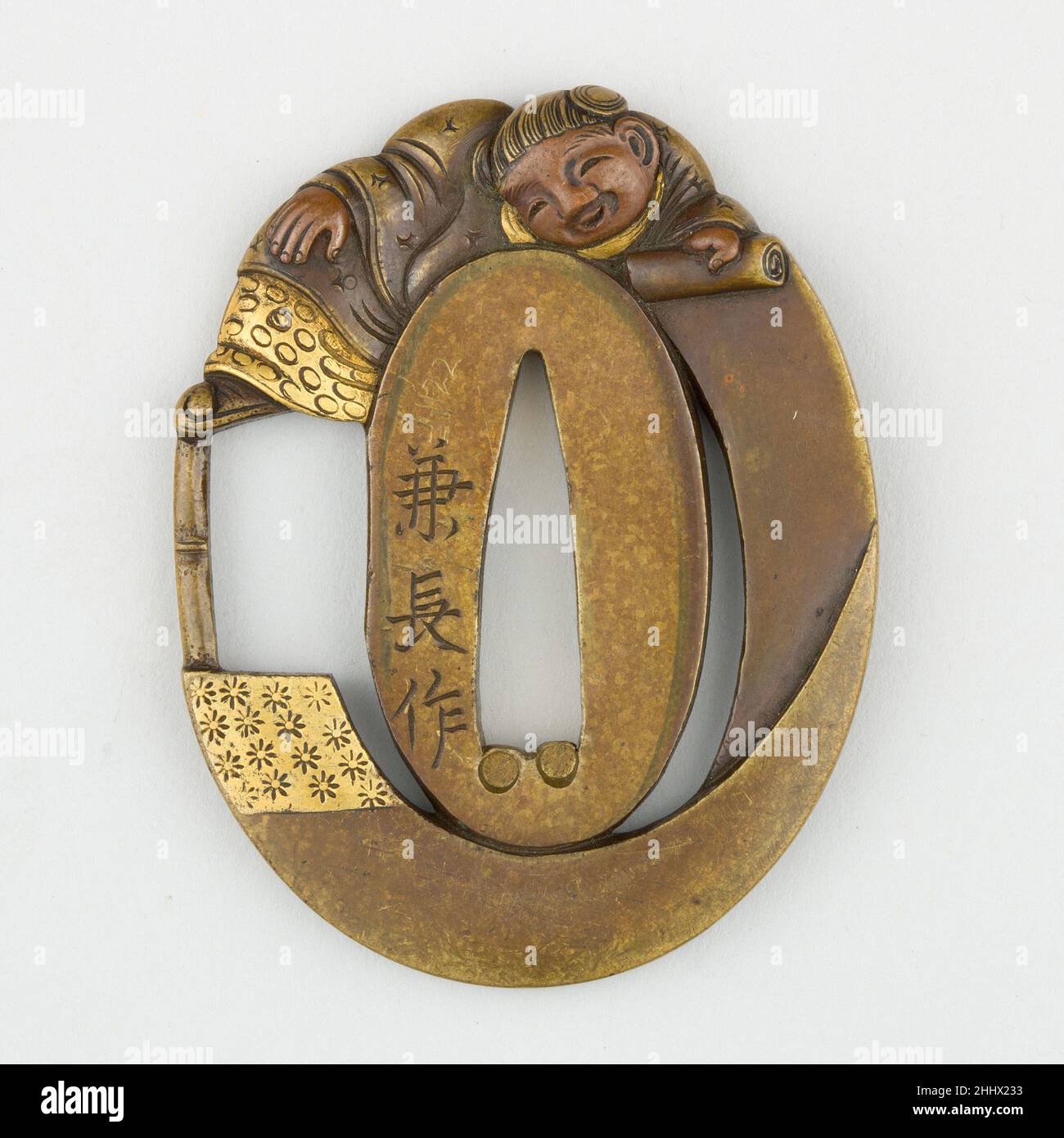 Sword Guard (Tsuba) Depicting Hanshan and Shide (寒山拾得図鐔) ca. 16151868 Japanese This tsuba is