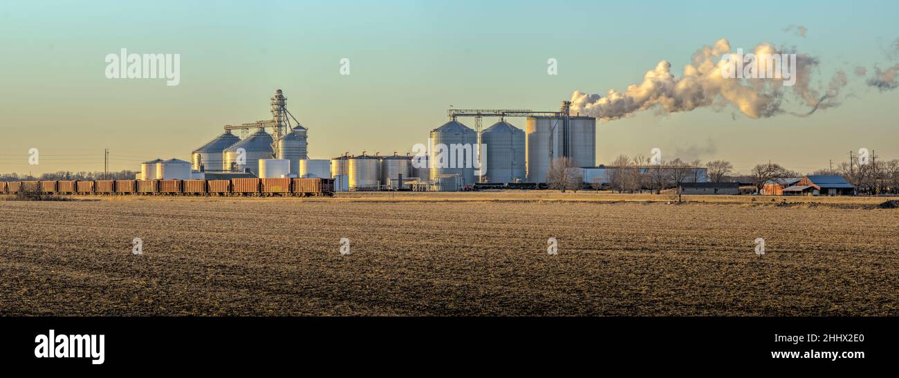 Industrialized Midwestern landscape. Transportation of energy assets. Stock Photo