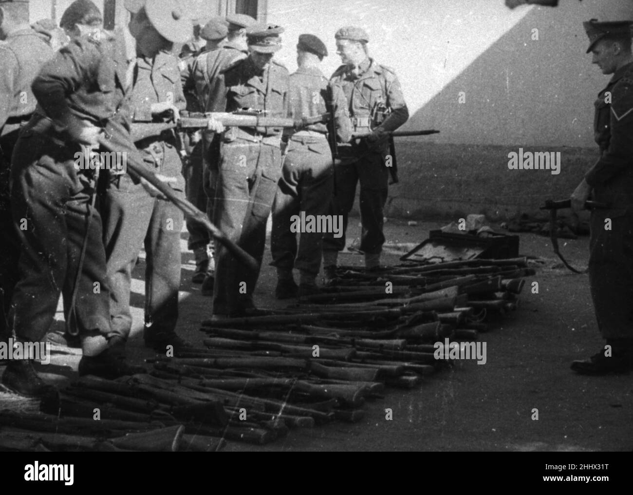 Aftermath of the Ismalia Riots 27th January 1952.   Captured weapons     The Ismalia riots represented a major clash between British Forces and Egyptian auxiliary police in Ismailia, Egypt.    Ismailia is located on Lake Timsah along the coast of the Canal, half-way between Port Said and Suez.     In presend day, The Ismailia Governorate is the capital of the Canal region where the Suez Canal Authority has its headquarters. Stock Photo