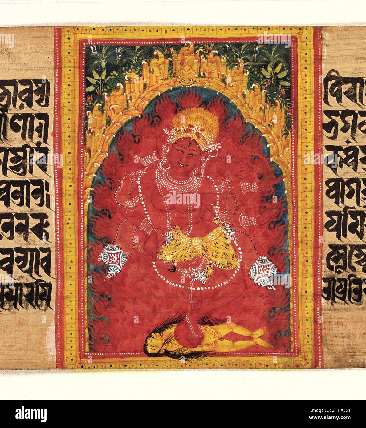 Kurukulla Dancing in Her Mountain Grotto: Folio from a Manuscript of the Ashtasahasrika Prajnaparamita (Perfection of Wisdom) early 12th century India, West Bengal or Bangladesh Emphasizing her role as destroyer of corruption, the goddess Kurukulla is surrounded by a halo of flame and dances on a corpse. Like so many of the aggressive deities that emerged in the esoteric tradition, Kurukulla is understood to be an emanation of one of the Tathagatas—in this case, the calm celestial Buddha Amitabha, who presides over the western Pure Land. Such dualistic female-male or aggressive-pacific relatio Stock Photo