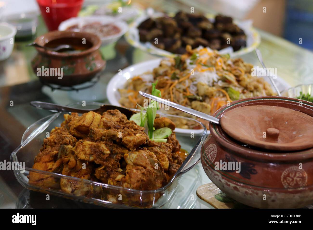 Table full of different dishes Stock Photo Alamy