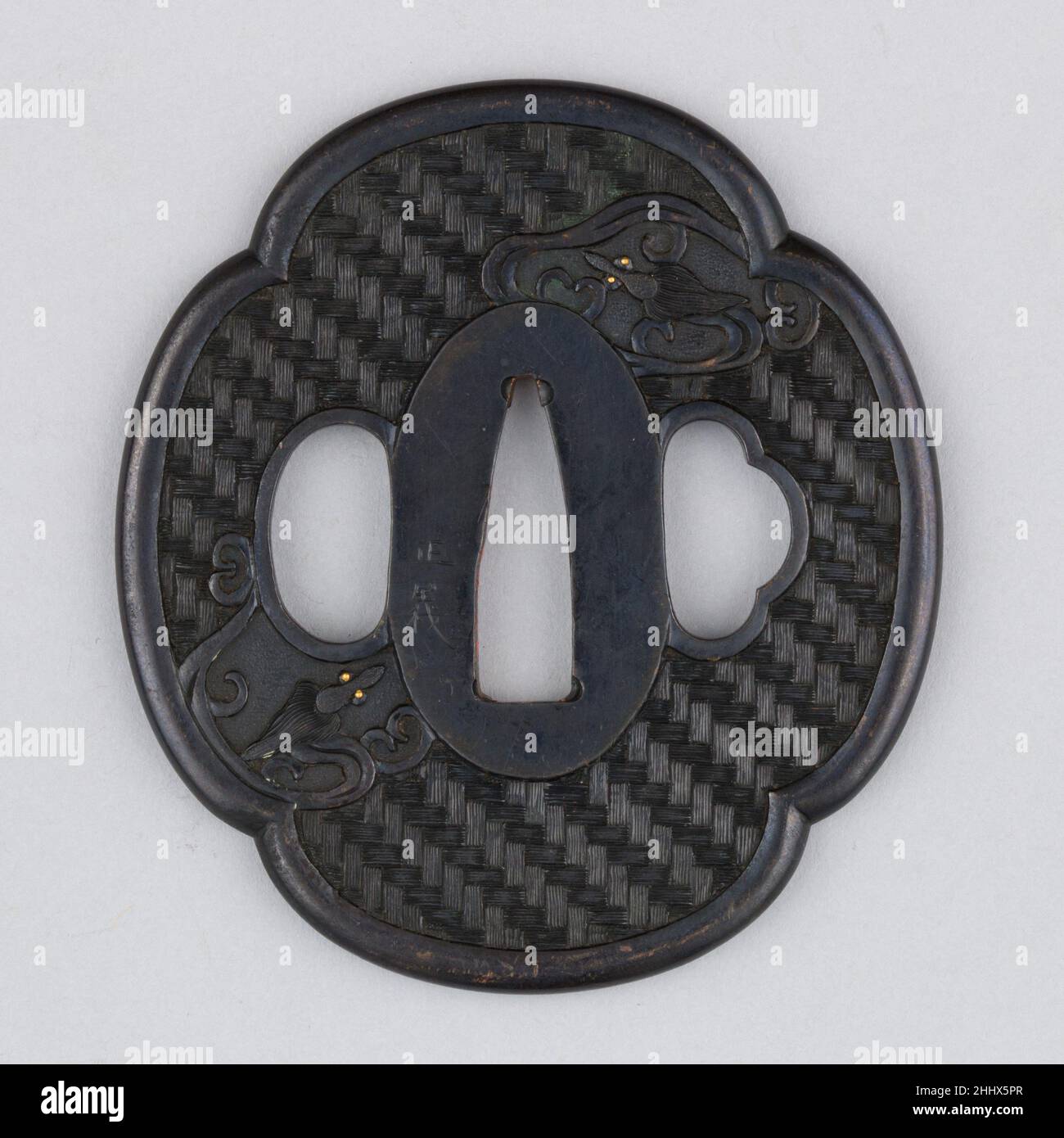 Sword Protection Sword Guard (Tsuba) 18th century Japanese A tsuba is a sword guard and ...