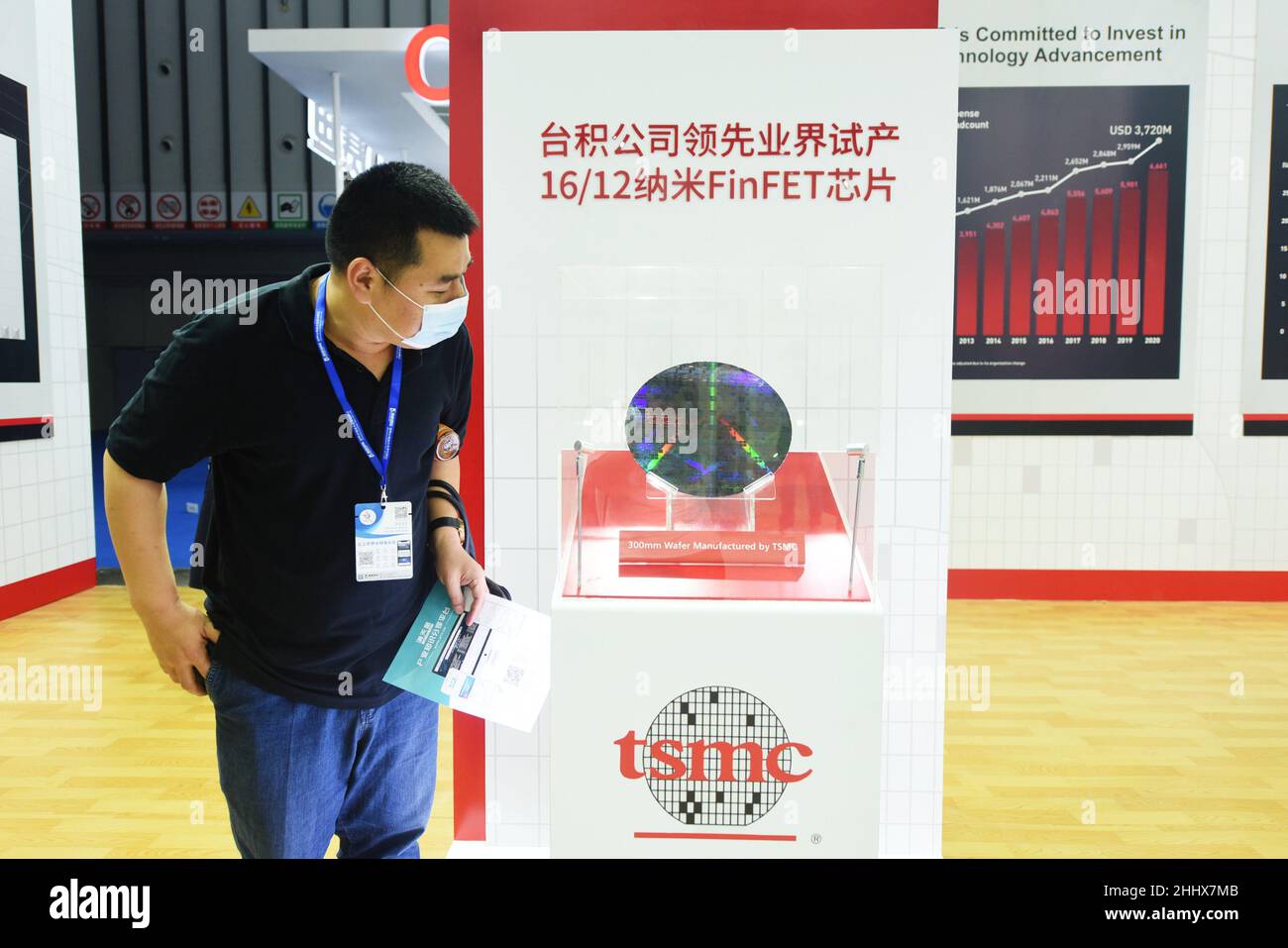 NANJING, CHINA - JUNE 9, 2021 - Visitors visit the booth of TSMC at the ...
