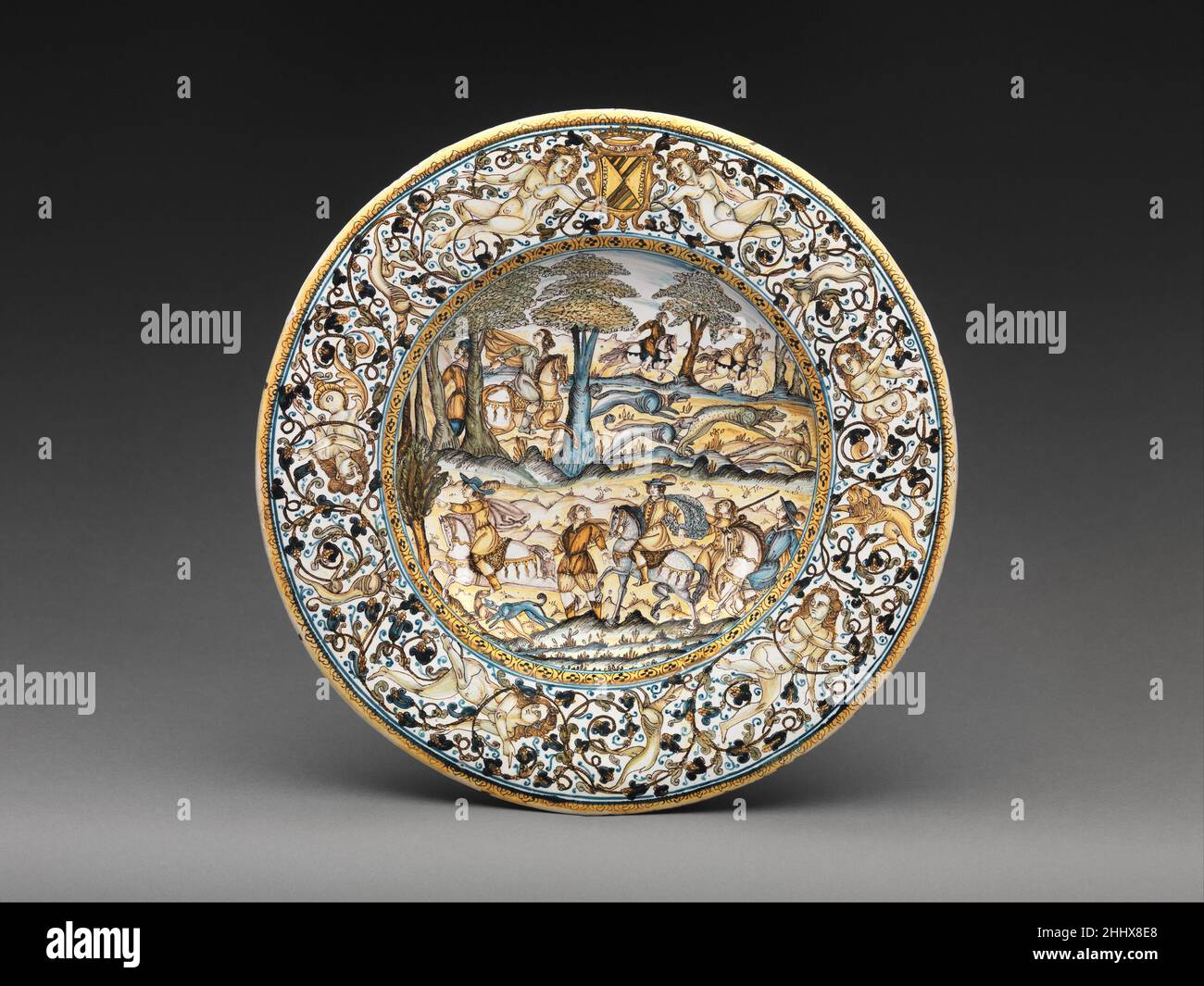 Plate with hunting scene and arms of the Alarçon y Mendoza family ca. 1640–50 Francesco Grue. Plate with hunting scene and arms of the Alarçon y Mendoza family  201649 Stock Photo