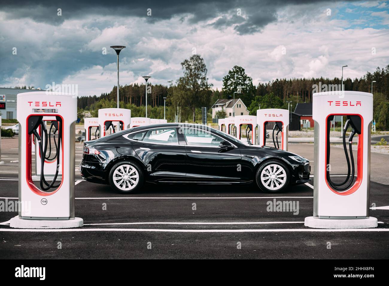 Black Color Tesla Model S 100d Car Parked At Charging Station. The ...