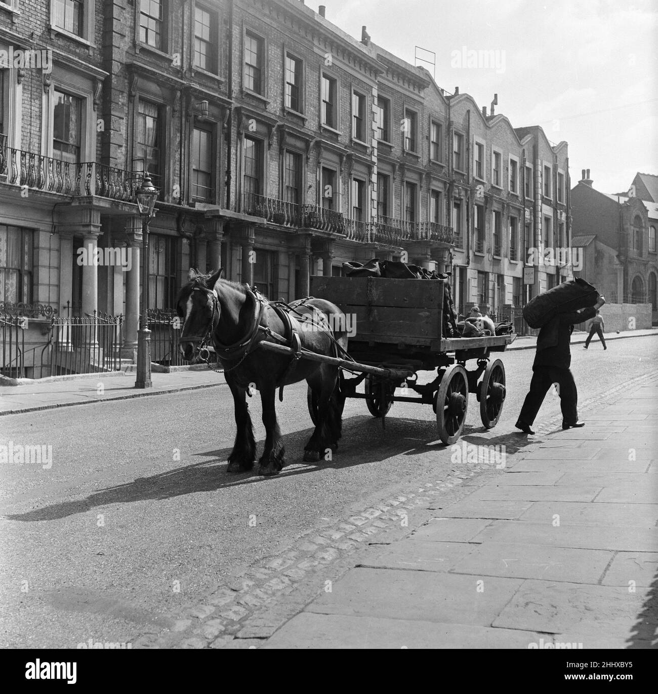 Coalman Mr Nightingale delivering coal. 25th April 1955 Stock Photo - Alamy