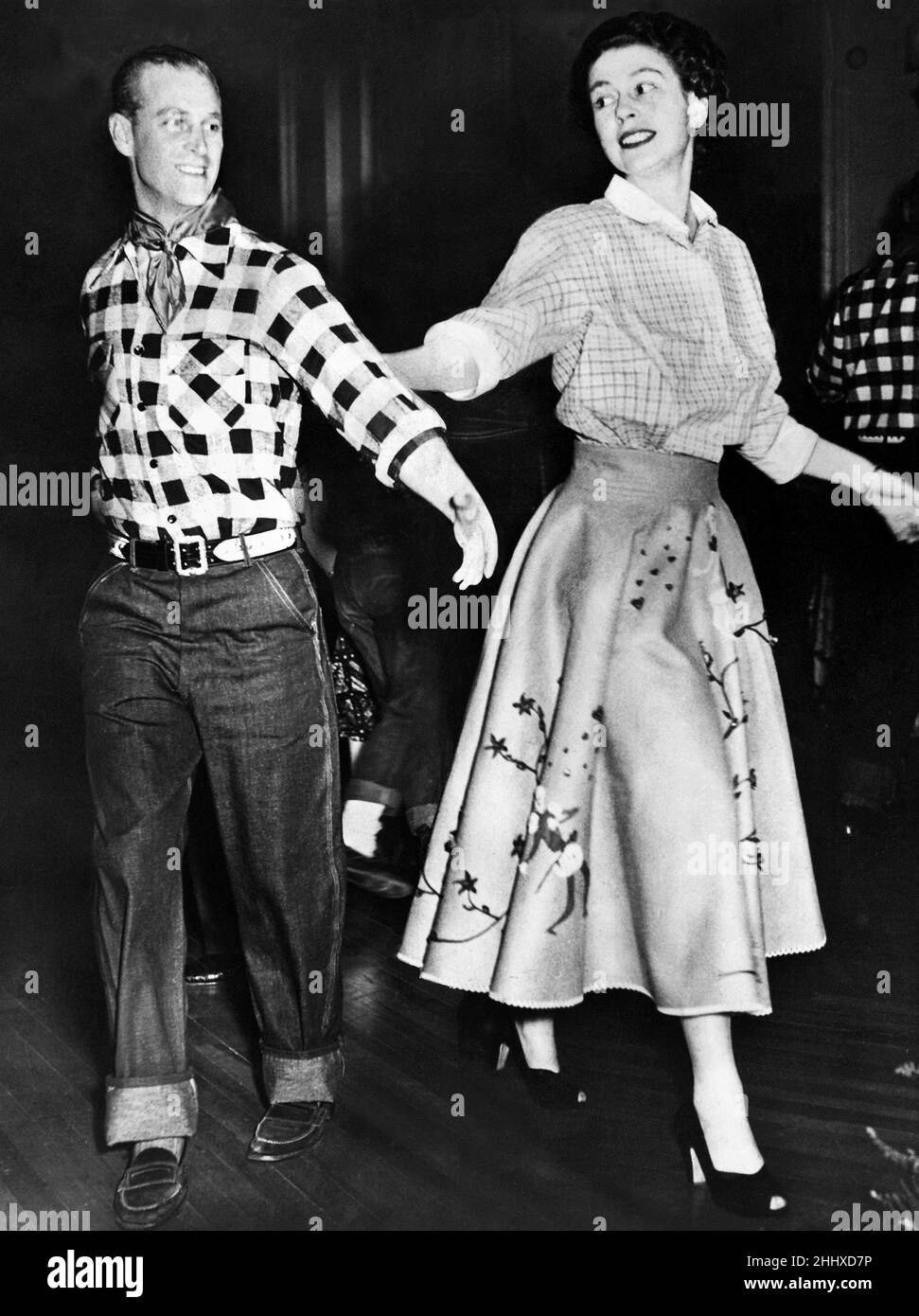 Queen Elizabeth II dancing with Prince Philip Stock Photo - Alamy