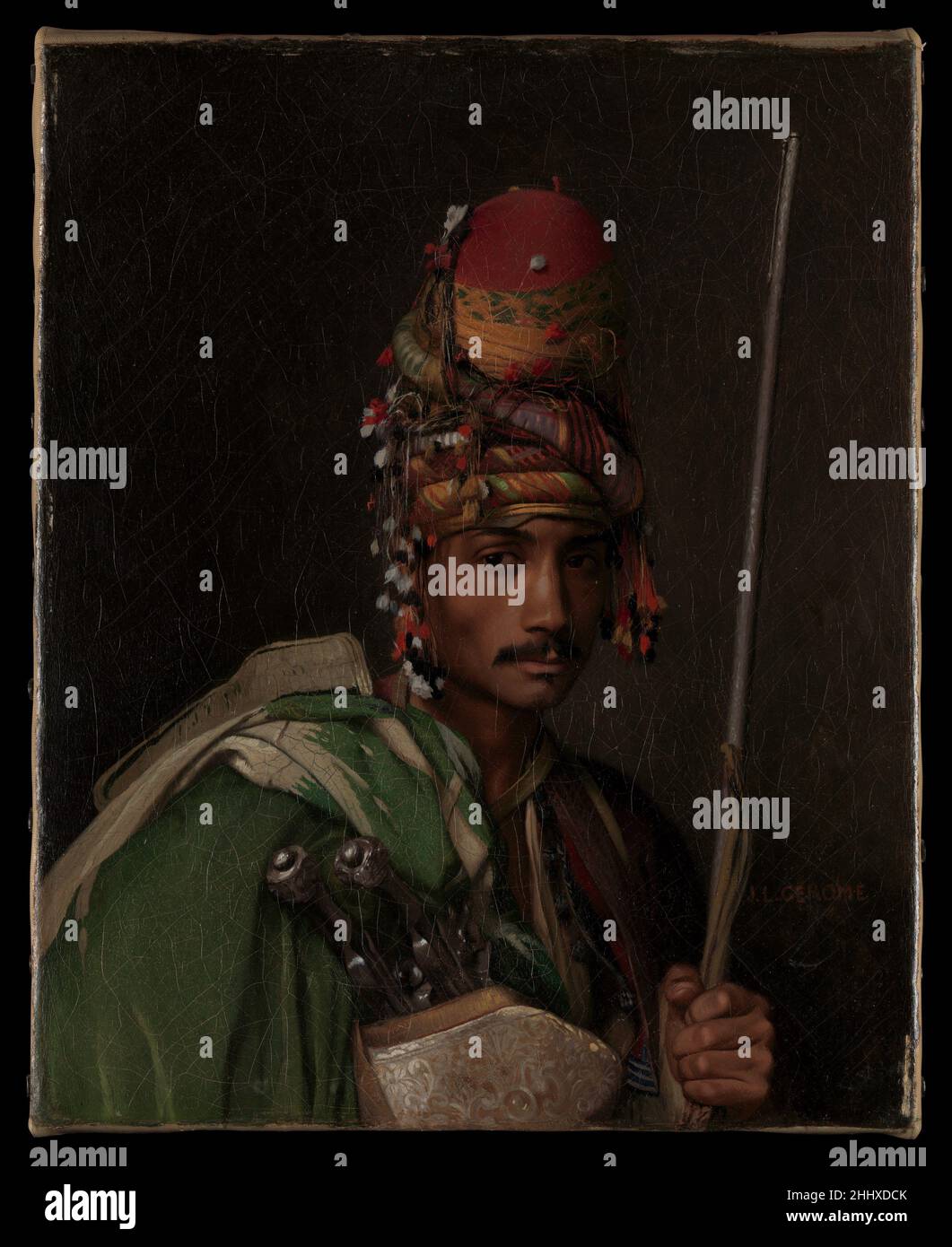 Bashi-Bazouk ca. 1868–69 Jean-Léon Gérôme French Gérôme depicted the extraordinary head-piece seen in this painting in the larger Bashi-Bazouk hanging on the same wall, which features a different model. The two canvases were painted more or less simultaneously, with no diminution of detail in the smaller picture. Shortly after its completion, the present work was acquired by John Taylor Johnston (1820–1893), the first president of the Metropolitan Museum.. Bashi-Bazouk  651837 Stock Photo
