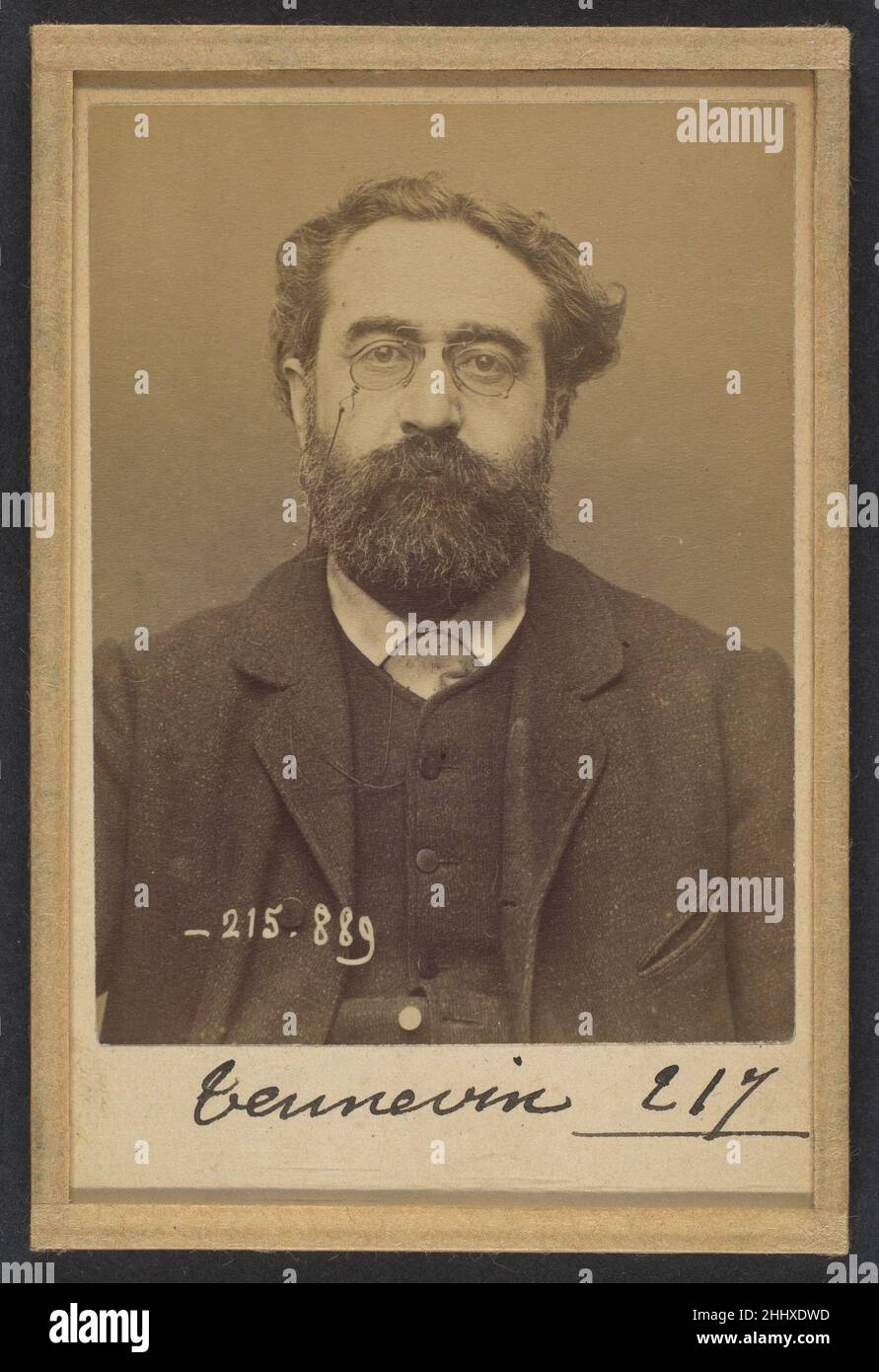 Tennevin. Alexandre. 48 ans, né à Paris. Comptable. Anarchiste. 19/3/94. 1894 Alphonse Bertillon Born into a distinguished family of scientists and statisticians, Bertillon began his career as a clerk in the Identification Bureau of the Paris Prefecture of Police in 1879. Tasked with maintaining reliable police records of offenders, he developed the first modern system of criminal identification. The system, which became known as Bertillonage, had three components: anthropometric measurement, precise verbal description of the prisoner’s physical characteristics, and standardized photographs of Stock Photo