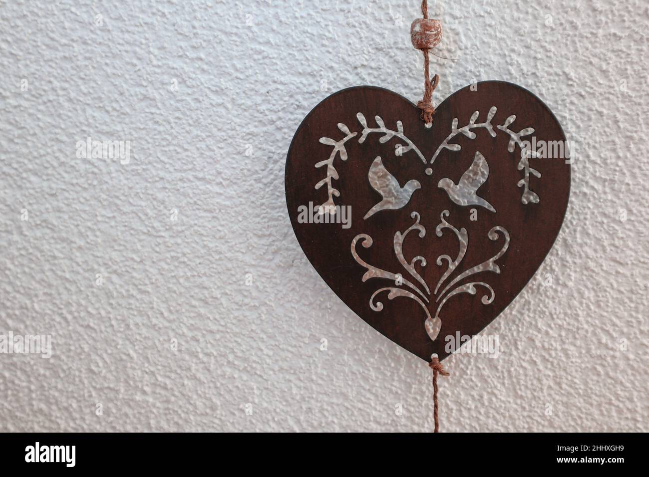 Vintage Metal heart on a white background Stock Photo - Alamy