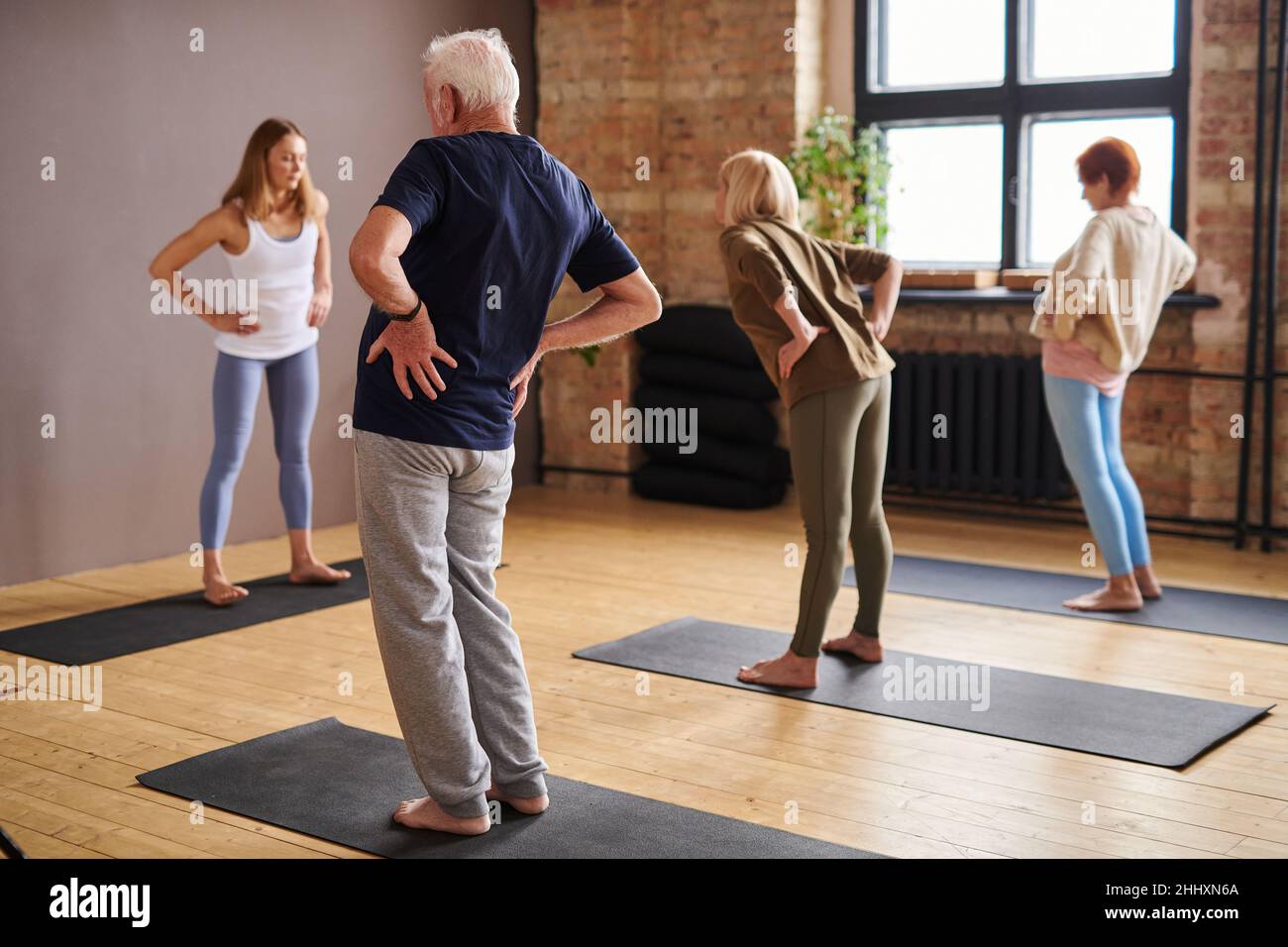 Old and young people exercise hi-res stock photography and images - Alamy