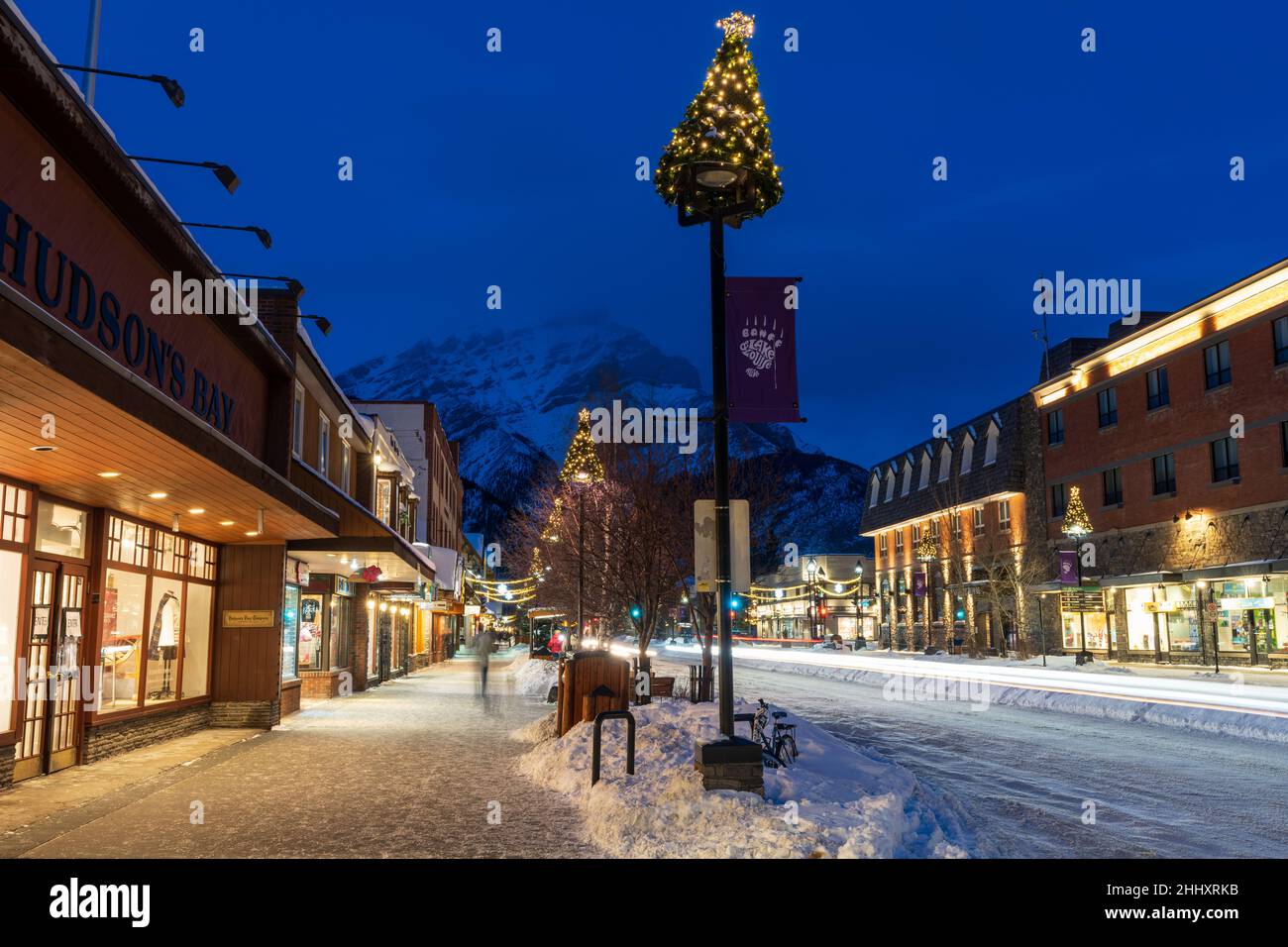 Town of Banff, Alberta, Canada - January 10 2022 : Downtown Banff Avenue in winter night. Stock Photo