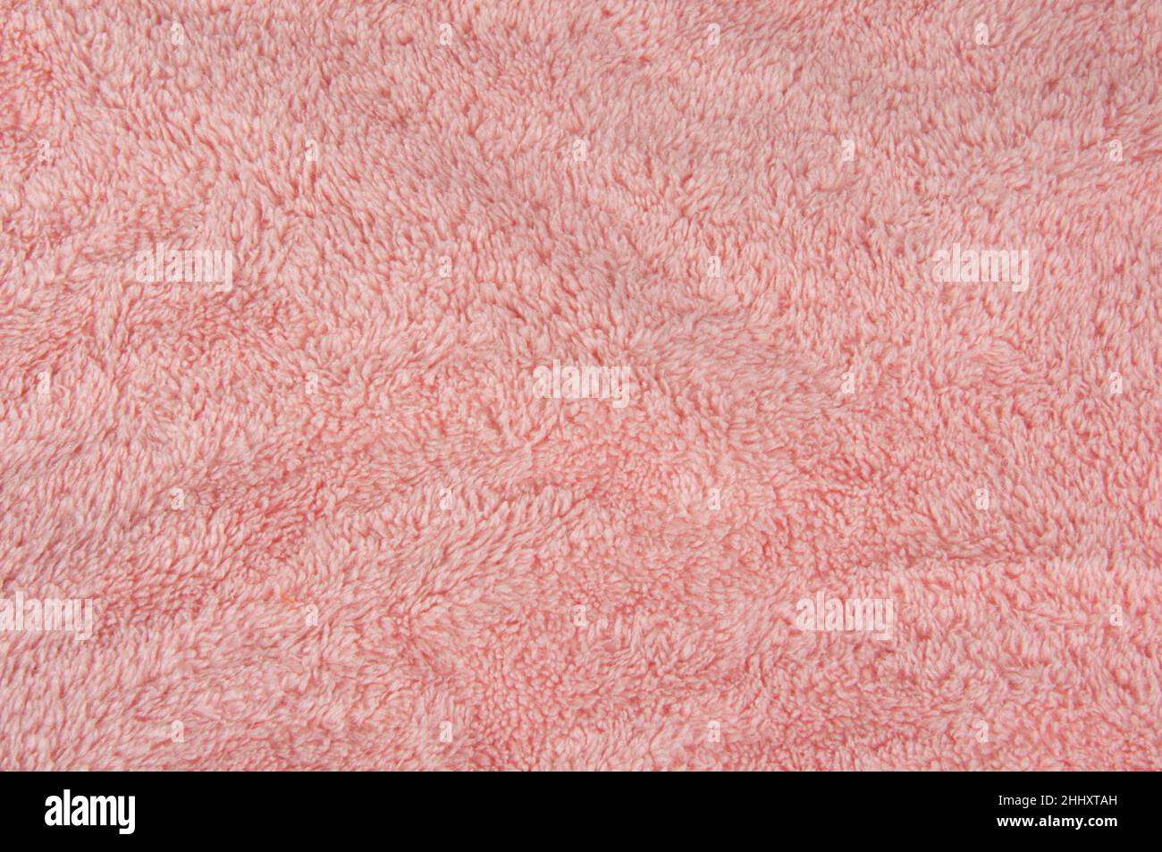 Pink fabric fluffy material texture background Stock Photo - Alamy