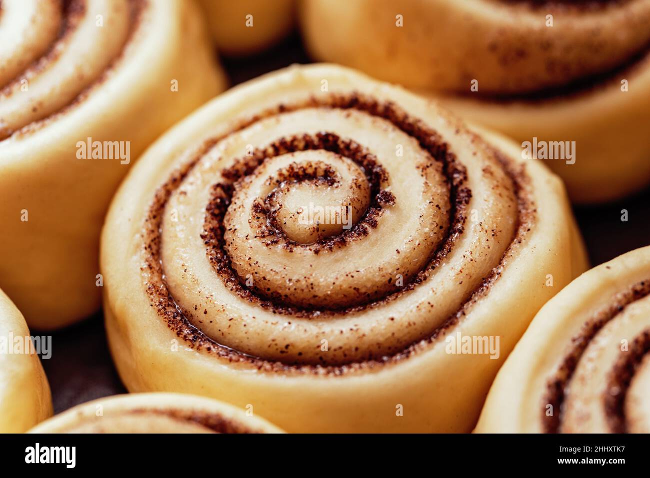 Raw Cinnamon rolls or cinnabon close up, Raw cinnamon rolls ready for