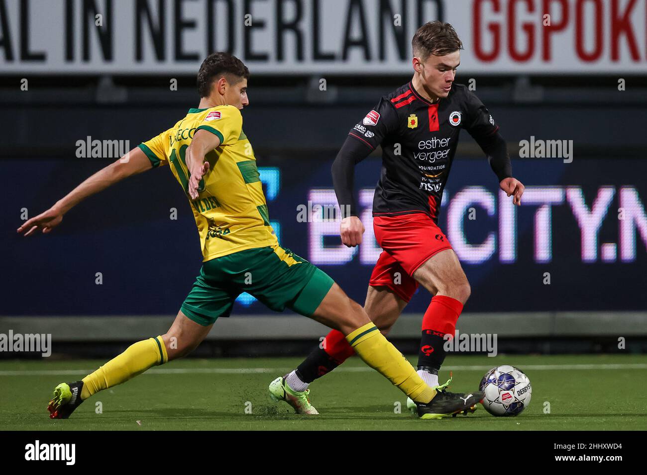 ROTTERDAM, NETHERLANDS - JANUARY 25: Samy Bourard of ADO Den Haag and Thijs Dallinga of Excelsior during the Dutch Keukenkampioendivisie match between Excelsior and ADO Den Haag at Van Donge & De Roo Stadion on January 25, 2022 in Rotterdam, Netherlands (Photo by Herman Dingler/Orange Pictures) Stock Photo