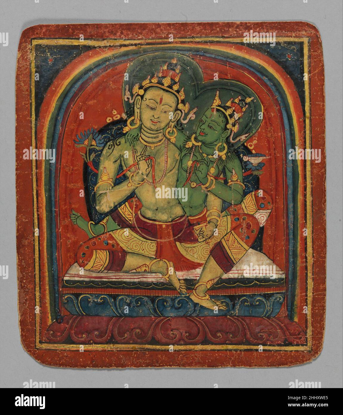 Initiation Card (Tsakalis): Manjushri early 15th century Tibet Tsakali cards were used by itinerant teachers moving from one monastery to another in order to evoke Vajrayana Buddhist deities. When laid on the ground in the form of a mandala, as seen here, they functioned to create a fixed sacred space like that of a temple. The deities shown on these initiation cards include the Tathagata Buddhas, various bodhisattvas, fierce protectors, and the six possible realms of rebirth seen across the bottom. They probably were made by a Nepali artist for a Tibetan patron of the Nyingma school of Tibeta Stock Photo