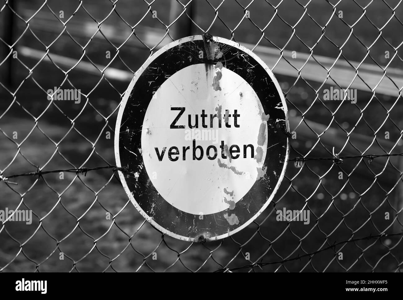 old german sign fixed at a fence 'Zutritt verboten' (no entry) Stock Photo
