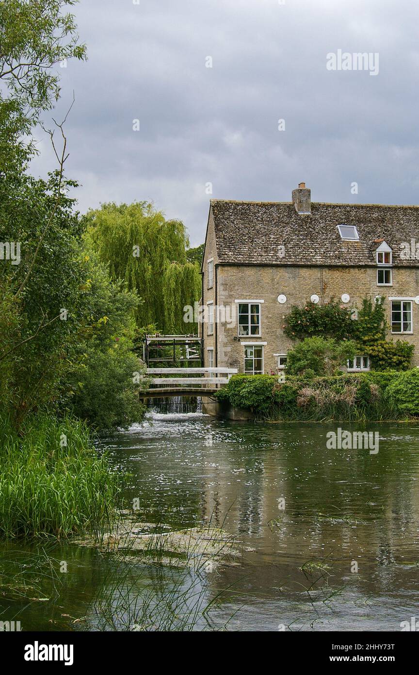 Wadenhoe Mill, an old watermill on the River Nene, Northamptonshire UK; has Medieval origins but mainly late 18th century building. Stock Photo
