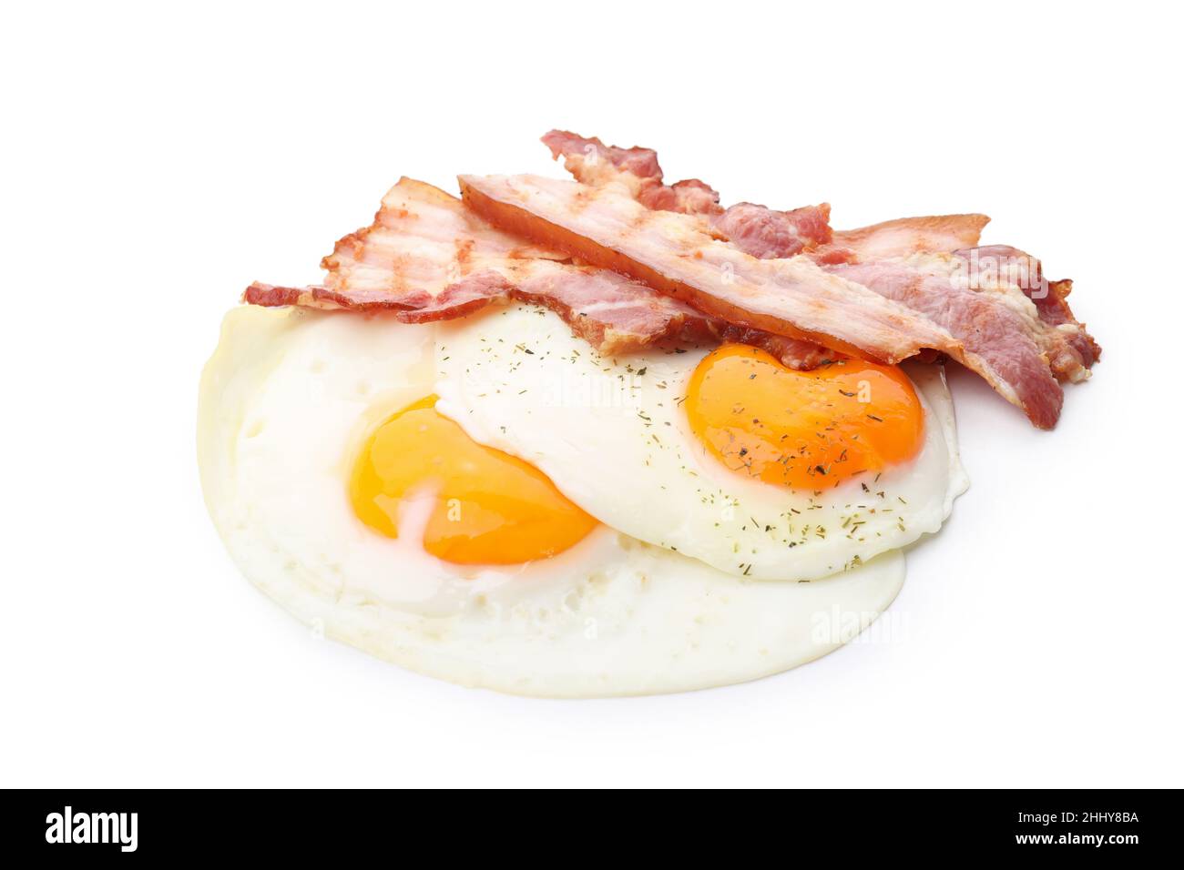 Fried eggs and bacon isolated on white background Stock Photo - Alamy