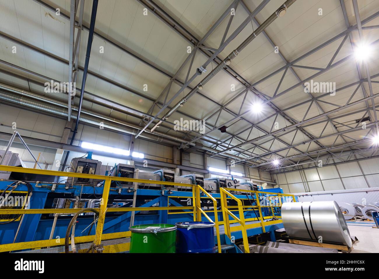 Production line of metal tile for roof. Steel forming machine in ...