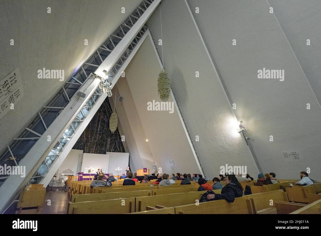 Inside the Arctic Cathedral on a winter night, during a Midnight and Northern Lights Concert (Tromsø, Norway) ESP: Catedral del Ártico, Tromsø Noruega Stock Photo