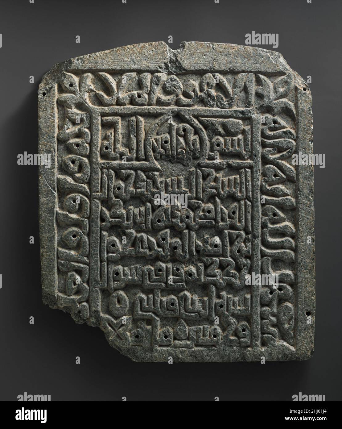 Gravestone of Muhammad ibn Abi Bakr, died Shawwal A.H. 532/ June/July A.D. 1138 dated A.H. 532/A.D. 1138 The inscription states that it is the tombstone of “the Shaykh, the martyr Jamal al-Qura' Muhammad b. Abi Bakr b. Amin al-Muqri' Khwajakak.” “Shaykh” identifies the deceased as a scholar, Sufi, or social leader, while “martyr” suggests that his death did not occur naturally. The son of a muqri' or Qur'an reciter, Jamal is characterized as “al-Qura',” an ascetic. “Khwajakak” is related to the Persian word for merchant, possibly his occupation.. Gravestone of Muhammad ibn Abi Bakr, died Shaww Stock Photo