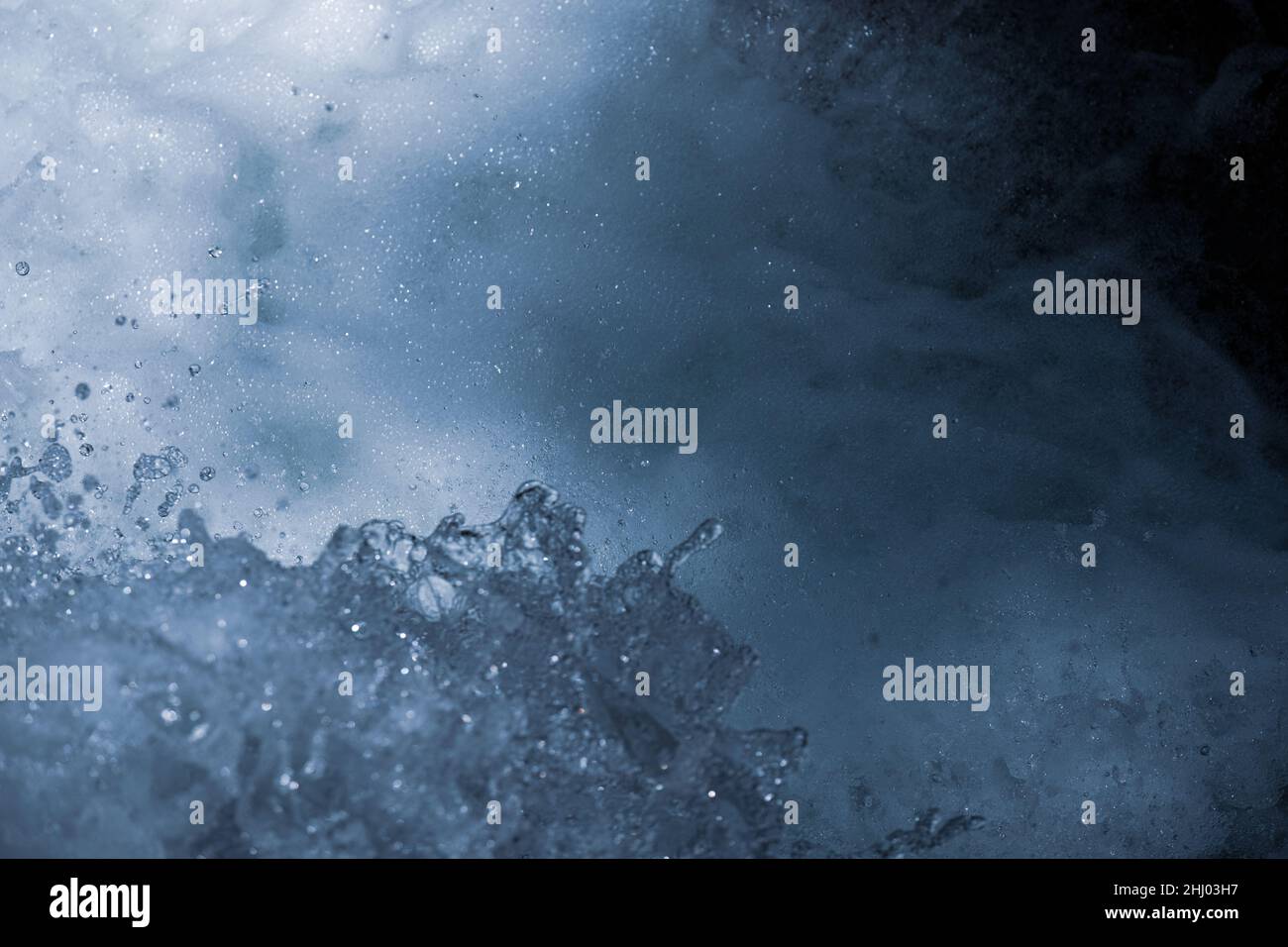 Close-up of the roaring water of a waterfall of the Giessbach Falls Stock Photo