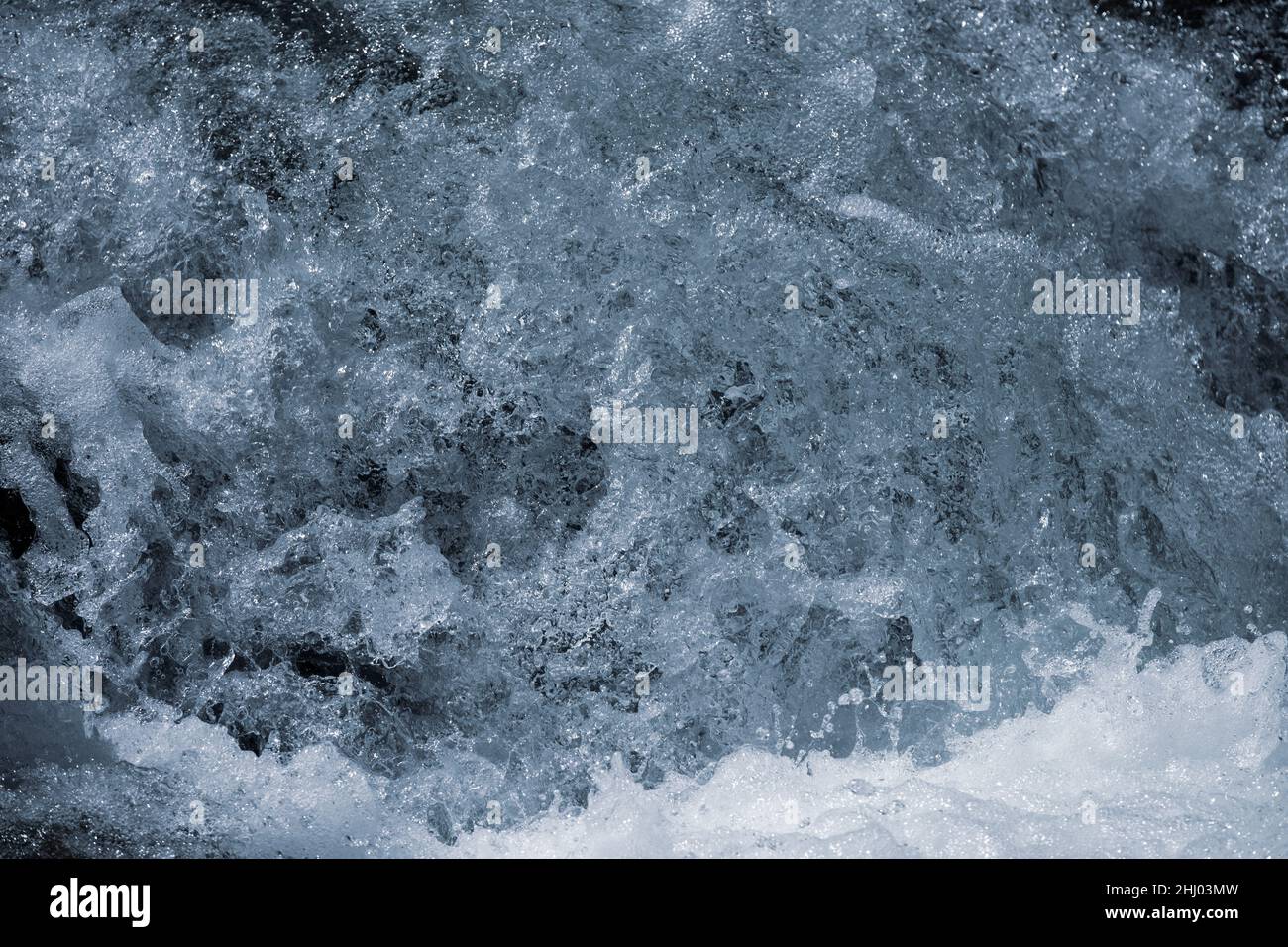 Close-up of the roaring water of a waterfall of the Giessbach Falls Stock Photo