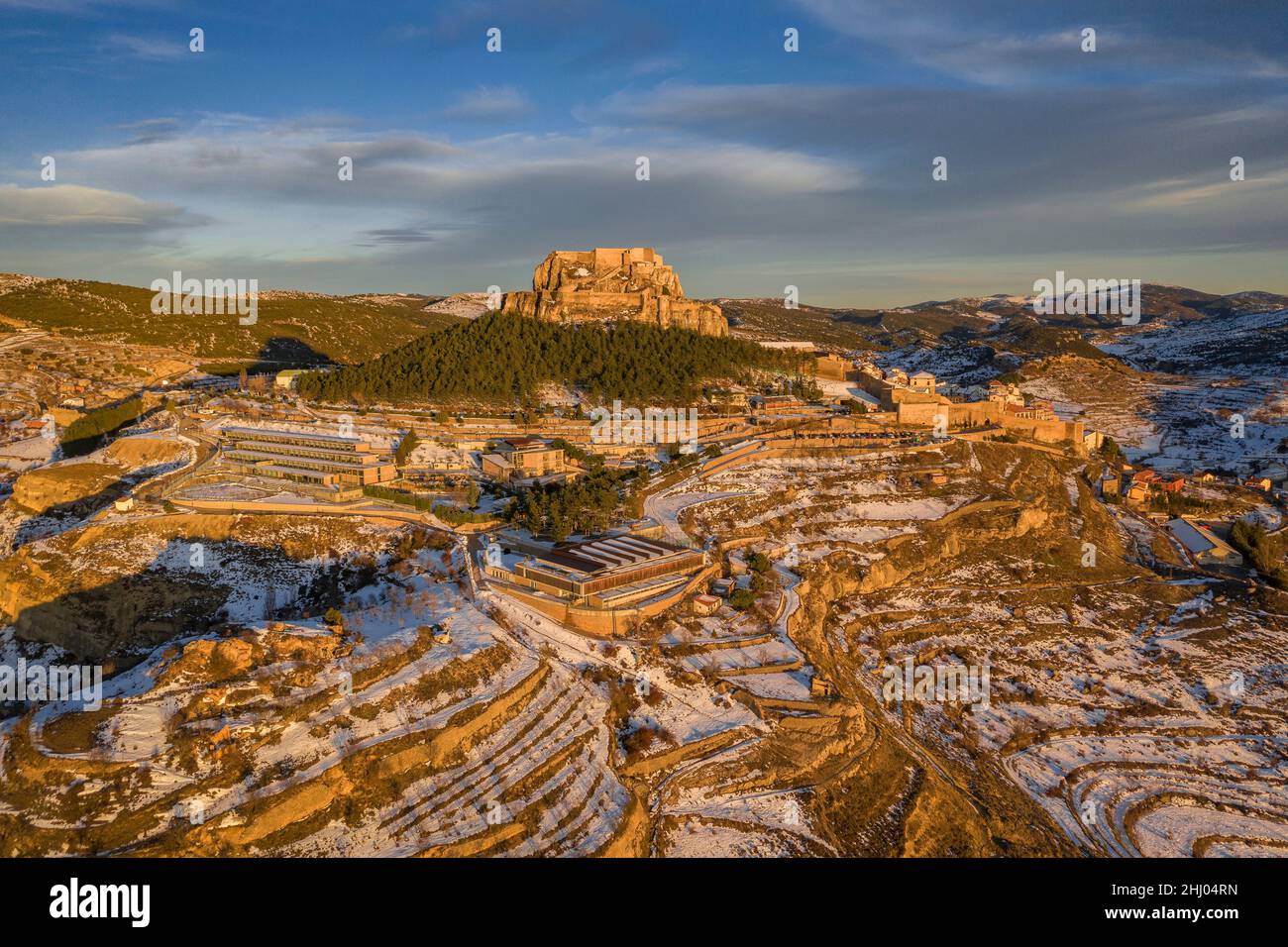 Morella medieval city aerial view, in a winter sunset, after a snowfall (Castellón province, Valencian Community, Spain) ESP: Vista aérea de Morella Stock Photo