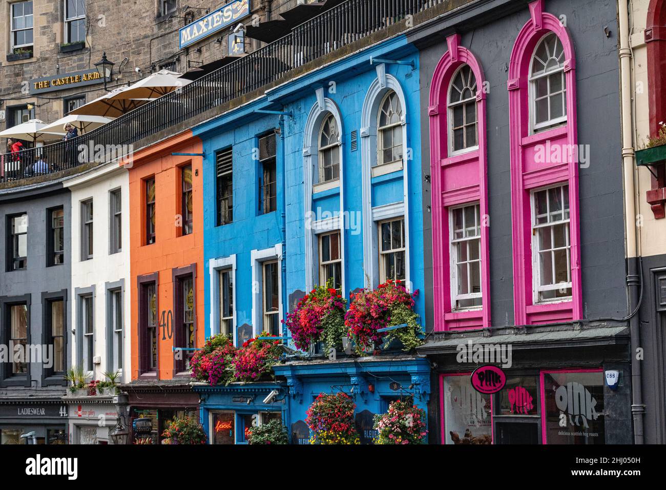 Bright Colourful Architectural Detail With Shop Fronts and Window Boxes in Edinburgh’s Famous West Bow & Victoria Terrace: Edinburgh, Scotland. Stock Photo