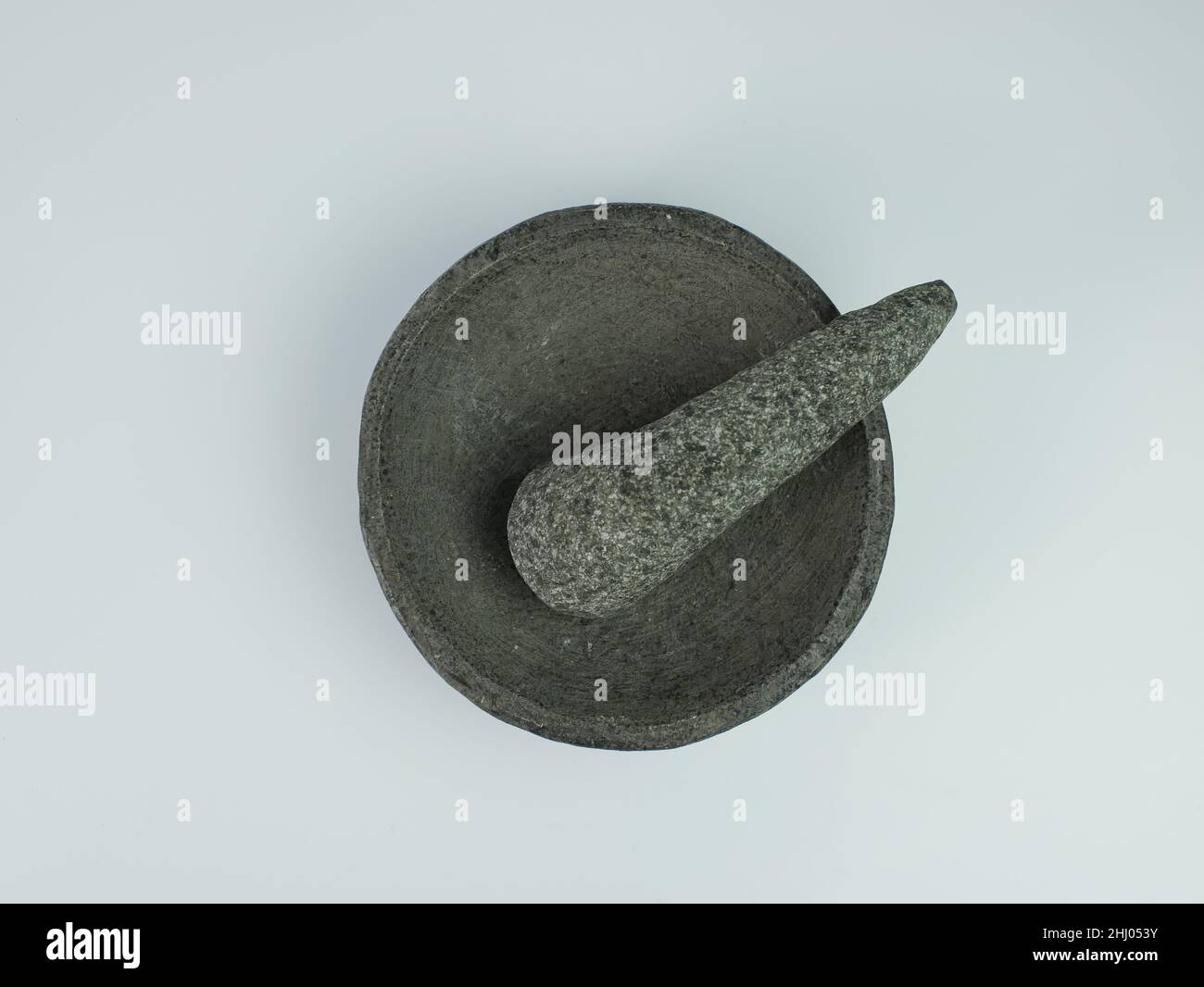 Indonesian traditional mortar and pestle isolated on a white background